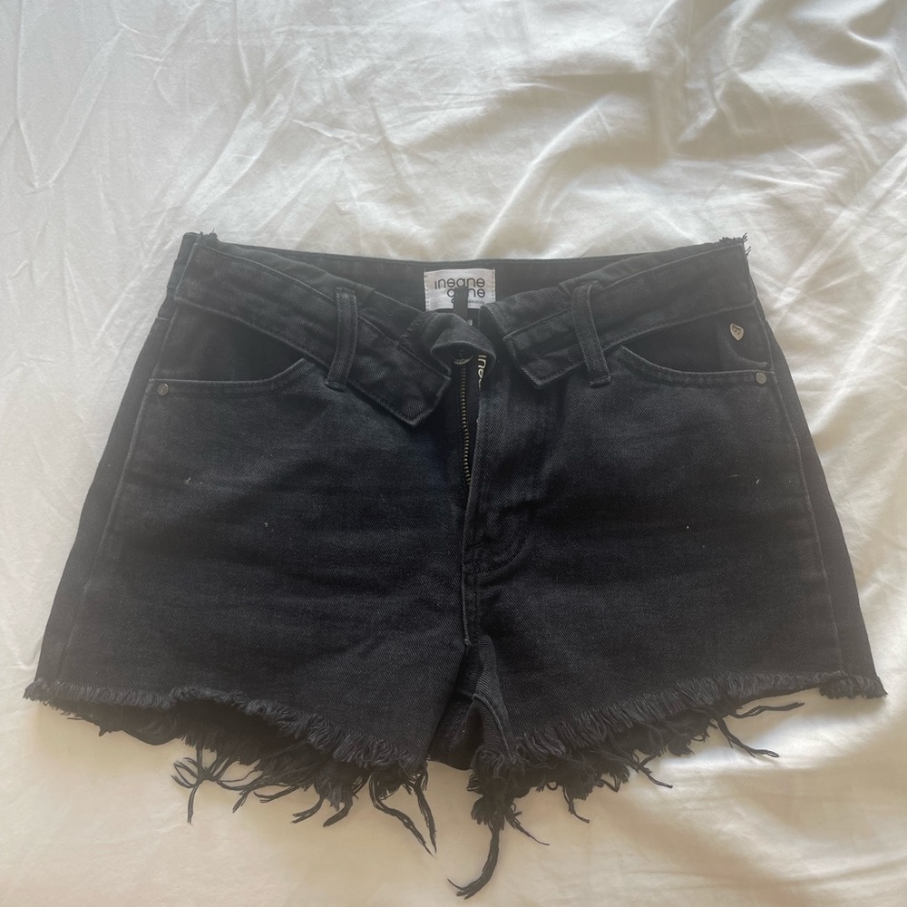 Black jean shorts with asymmetrical fold over band size small